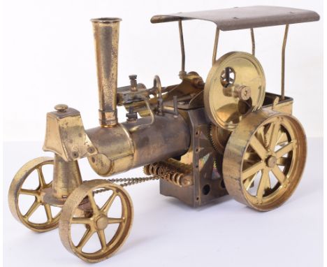 Wilesco D40 brass Live steam Traction engine, with mounted single cylinder, flywheel operating rear wheel, worm and gear stee
