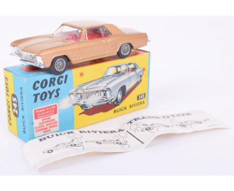 Boxed Corgi Toys 245 Buick Riviera, Trans -O-Lites, gold body, red interior, spoked wheels, in near mint condition, with a ex