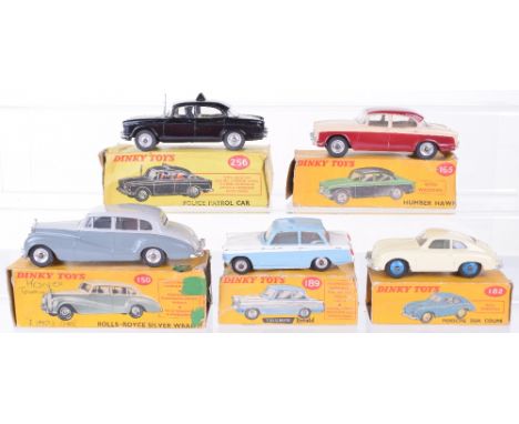 Five Boxed Dinky Toys, including 150 Rolls Royce Silver Wraith (part of front bumper missing)165 Humber Hawk, maroon/cream, 1