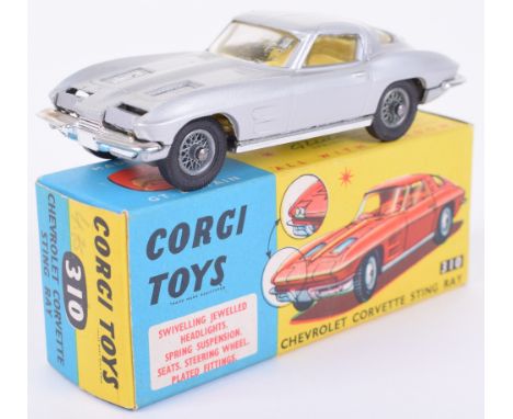 Corgi Toys 310 Chevrolet Corvette Sting Ray, metallic silver body, yellow interior, spoked wheel hubs, in near mint condition