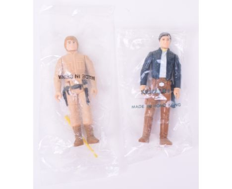 Two Star Wars Vintage original figures in baggies, Hans Solo Bespin outfit, with blue bespin blaster tape sealed in Kenner pl