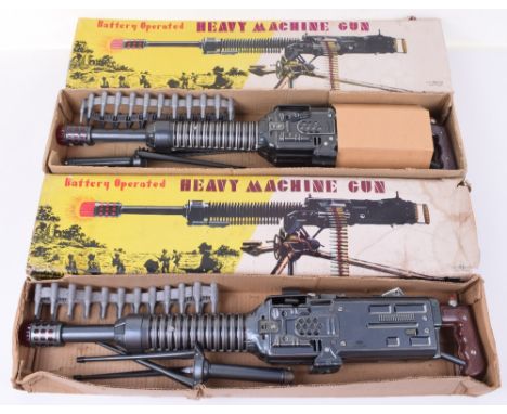 Two Normura (Japan) battery operated Heavy Machine Guns, with tripod stands, with plastic gun belts, both in good to excellen