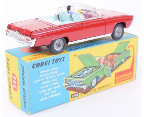 Corgi Toys 246 Chrysler Imperial, red body, light blue interior, cast wheel hubs, driver and passenger, ‘Surprise is in the b