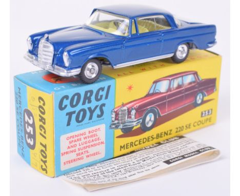 Corgi Toys 253 Mercedes-Benz 220 SE Coupe, metallic blue body, yellow interior, spun wheel hubs, complete with suitcases, spa