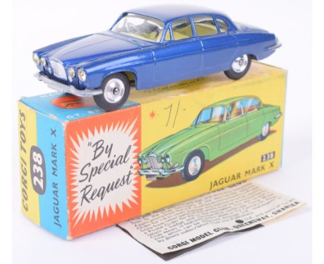 Scarce Corgi Toys 238 Jaguar Mark X, dark metallic blue body, yellow interior, spun wheel hubs, in near mint original conditi