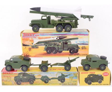 Dinky Toys boxed 665 Honest John Missile Launcher, military green with plastic hubs, in yellow detailed yellow picture box, e