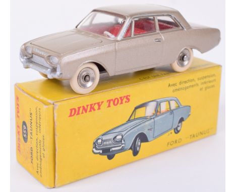 French Dinky 559 Ford Taunus 17M, metallic brown, concave hubs, white tyres, excellent condition, in yellow picture box, good