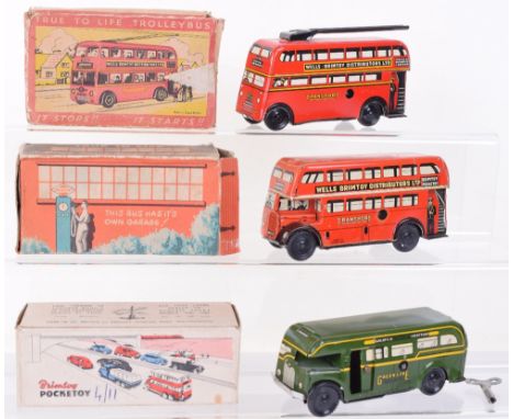 Three boxed Wells and Brimtoy Pocketoy tinplate buses, Transport Trolley bus, red AWW 516, very good condition, box fair, cre