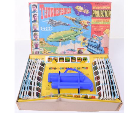 Chad Valley Thunderbirds Projector, 112 colour slides, 16 complete stories, battery operated, in very good condition, lid of 