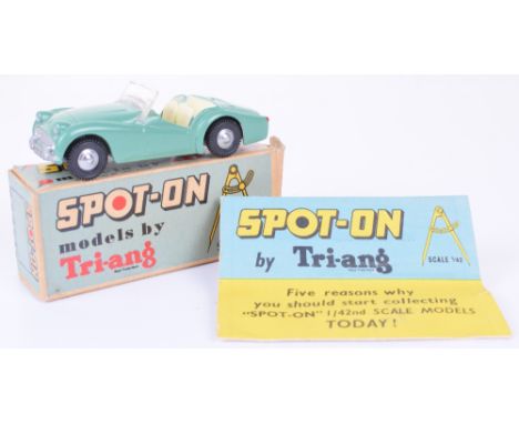 Triang Spot-on 108 Triumph T.R.3 pale green body, cream interior, in excellent condition, Corgi number plates added, original