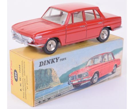 French Dinky 534 B.M.W 1500, red, concave hubs, excellent condition, in yellow box with detailed picture, good faded. 