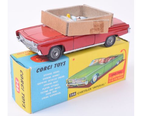 Corgi Toys 246 Chrysler Imperial, red body, light blue interior, cast wheel hubs, driver and passenger, ‘Surprise is in the b
