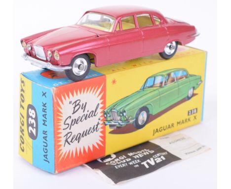 Corgi Toys 238 Jaguar Mark X, metallic cerise body, yellow interior, spun wheel hubs, in near mint original condition, comple