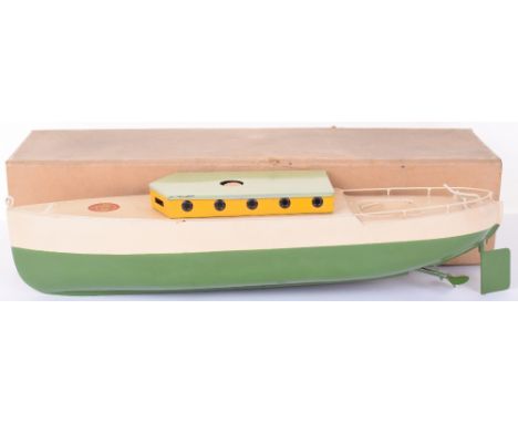 Rare Sutcliffe 16” Clockwork Commodore Cabin Cruiser, circa 1935, green/cream hull/deck, light green/yellow cabin, ‘Sutcliffe