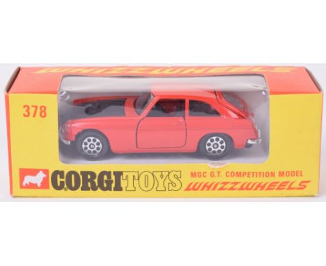 Corgi Toys 378 MGC G.T. red body, mat black bonnet, black interior, Whizzwheel hubs, with suitcase, in mint original conditio