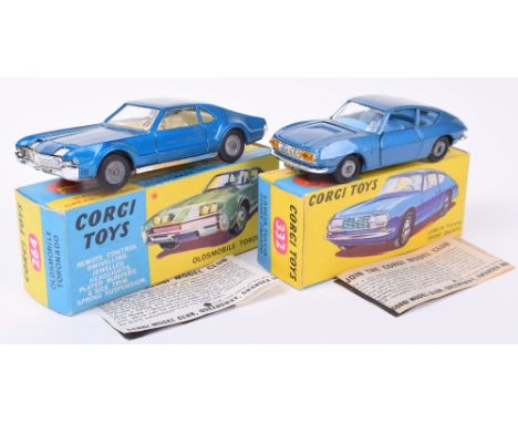 Two Boxed Corgi Toys 264 Oldsmobile Toronado, metallic blue body, cream interior, cast wheel hubs, in excellent original cond