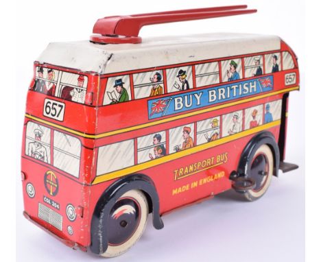 Brimtoy tinplate c/w Double Decker Trolley bus 657, red with white roof and tin printed Buy British and Brimtoy Train are the
