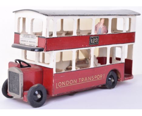 Tri-ang Toys wooden London Transport Double Decker bus Service 123, circa 1935, finished in red and white with grey roof, bat