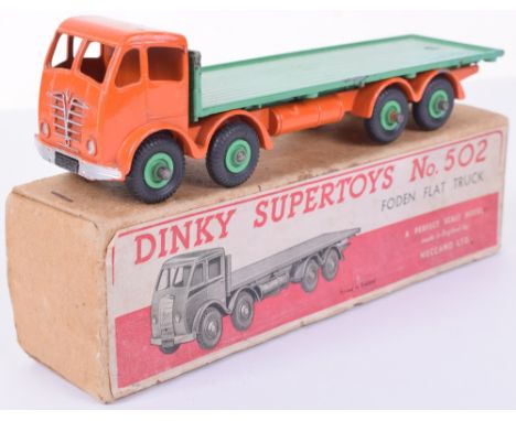 Dinky boxed 502 Foden Flat truck, 2nd type orange cab and chassis, mid-green back and hubs, generally good condition, few chi