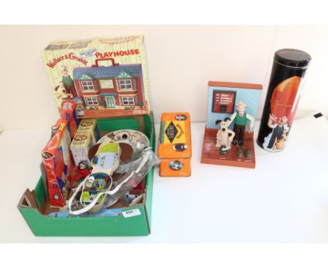 Group of Wallace and Gromit collectables, incl. an alarm clock, miniature playsets, figures, Jacob's Crackers tin and plates,