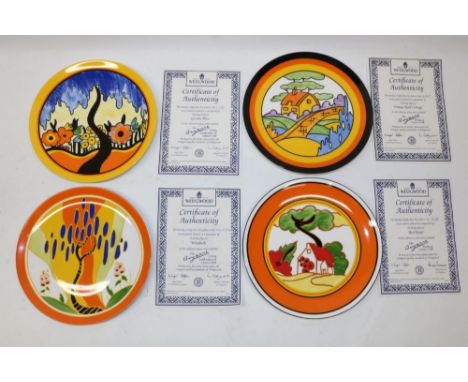 Four Wedgwood Clarice Cliff Bradford Exchange wall plates, patterns comprising 'Red Roofs', 'Windbells', 'Orange Roof Cottage