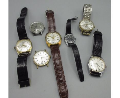 Caravelle chrome automatic wristwatch with date, signed silvered sunburst dial, applied baton hour indices, centre seconds, s