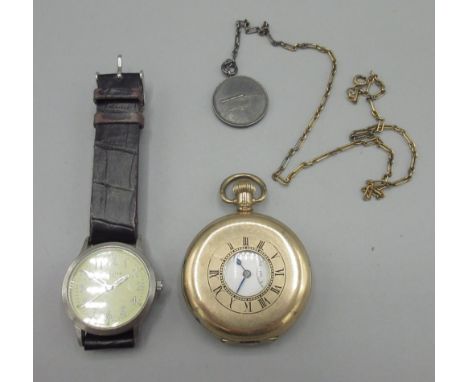 Swiss rolled gold half hunter keyless pocket watch; white enamel Roman dial, subsidiary seconds, Dennison Star case no. 91550