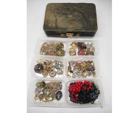 Collection of vintage and modern costume jewellery including faux pearls, brooches,  clip on earrings etc. and a jewellery bo