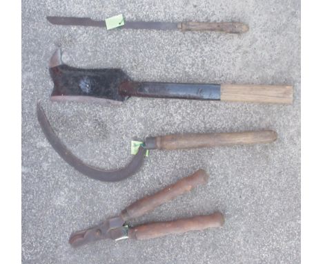 Selection of vintage hedging tools, including a swap, bill hook, loppers, a coppicing saw etc. 