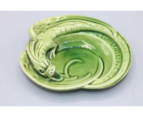 Burmantofts faience advertising dish or ashtray for the Leeds Fireclay Company, modelled as a grotesque dragon, the wings and