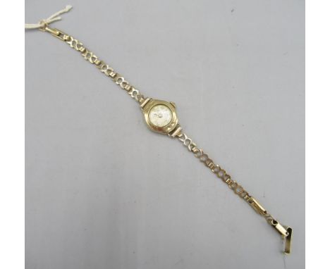 1960's ladies Rotary 9ct Rotary wristwatch on matching 9ct gold bracelet, signed silvered dial, applied Arabic and dot indice