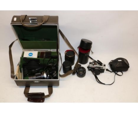 Collection of vintage cameras and lenses, incl. a Ricoh 500 GX and a Minolta SRT 101 