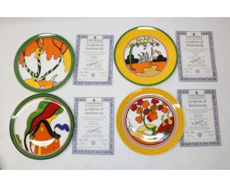 Four Wedgwood Clarice Cliff Bradford Exchange wall plates, patterns comprising 'Bridge Water', 'Orange House', 'Tulip', and '