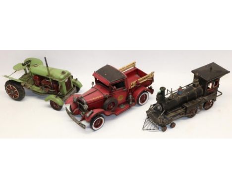 Three decorative American style model vehicles, comprising green tractor, locomotive, and fire truck, max. L36cm (3) 