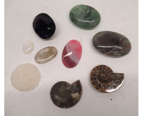 Amethyst, other large cut gemstones including rhodochrosite, fluorite, carved white jade, an ammonite, a smaller cabochon cut