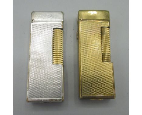 Dunhill Patented gold plated butane cigarette lighter, engine turned decoration and similar silver plated lighter, H6.4cm 