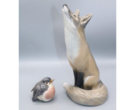 Royal Copenhagen figures of a seated fox, model 437, H26.5cm, and a robin, model 2266 (2)