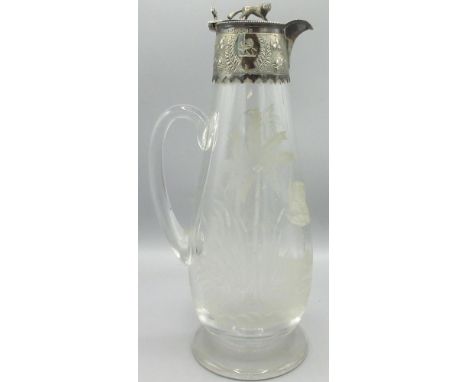 Victorian cut glass claret jug engraved with a swan in a tropical scene, silver mount engraved with a lion armorial crest and