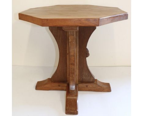 Robert Mouseman Thompson of Kilburn - an oak octagonal coffee table, adzed top on cruciform column support, H47cm W50cm 