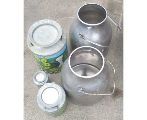 Pair of vintage aluminium milk churns, missing lids, and a collection of three decorative milk churns in different sizes, wit
