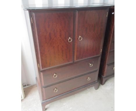 Stag Minstrel tallboy, two doors above two drawers on bracket feet, W82cm D47cm H112cm and a single drawer bedside cabinet (2
