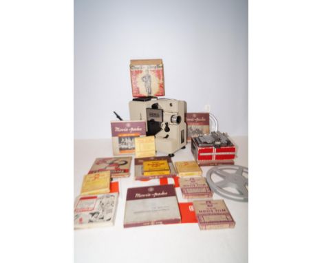 Eumig cine projector with a collection of reels with original box 