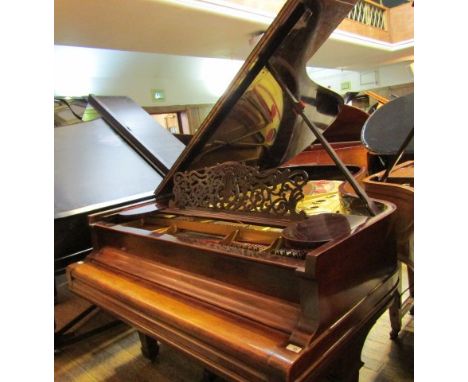 Steinway (c1909)A 6ft 11in Model B grand piano in a rosewood case on square tapered legs.