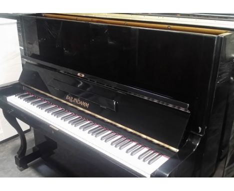 BallindammA recent Model B-133 upright piano in a bright ebonised case.