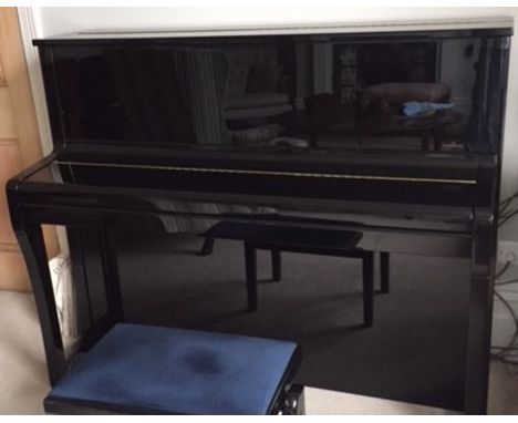 Schimmel (c2015)A Model K122 Elegance upright piano in a bright ebonised case.