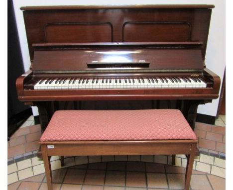 Steinway (c1884) A Model E upright piano in a rosewood case; together with a duet stool.