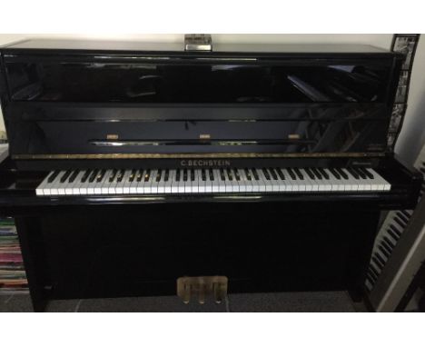 C Bechstein (c2000)A Model 116 upright piano in a bright ebonised case.