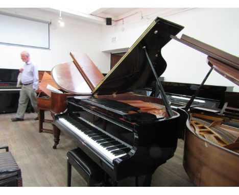 Ritter (c2009)A 4ft 8in Model 145 grand piano in a bright ebonised case on square tapering legs; together with a matching sto