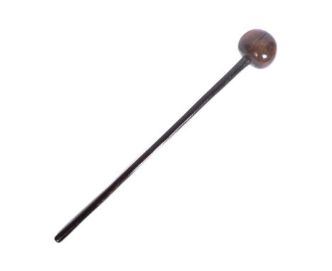 A mid 20th Century South African Zulu tribal club / Knobkerrie club. Globular shaped club head mounted to a wooden shaft. A h