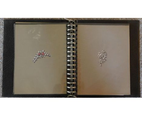 A folio containing 25 hand painted designs and patterns for jewellery. 23x9cm 